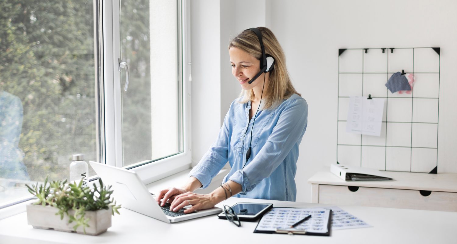 Businesswoman working at standing desk