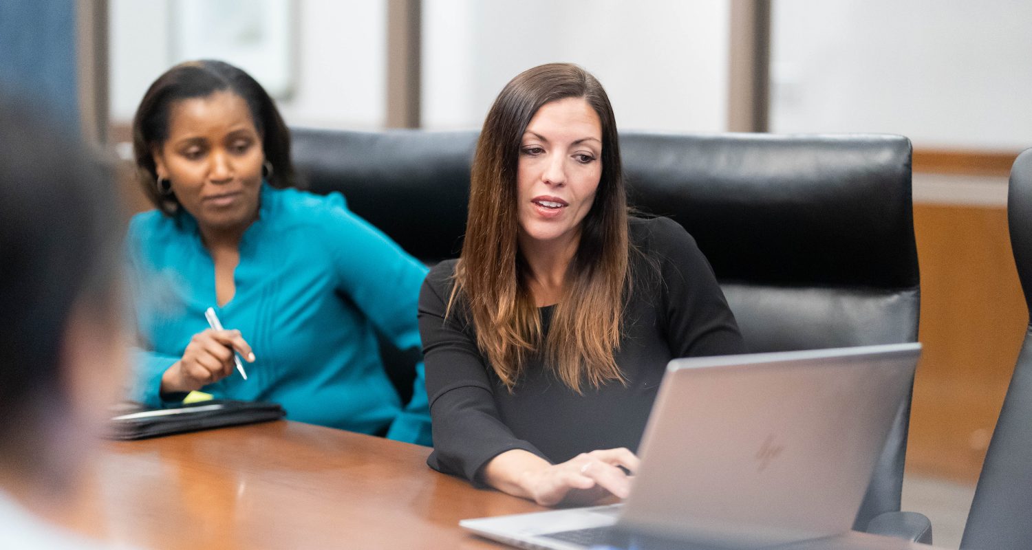 employees reviewing data
