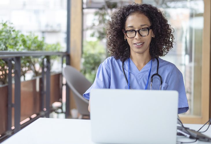 Nurse working online